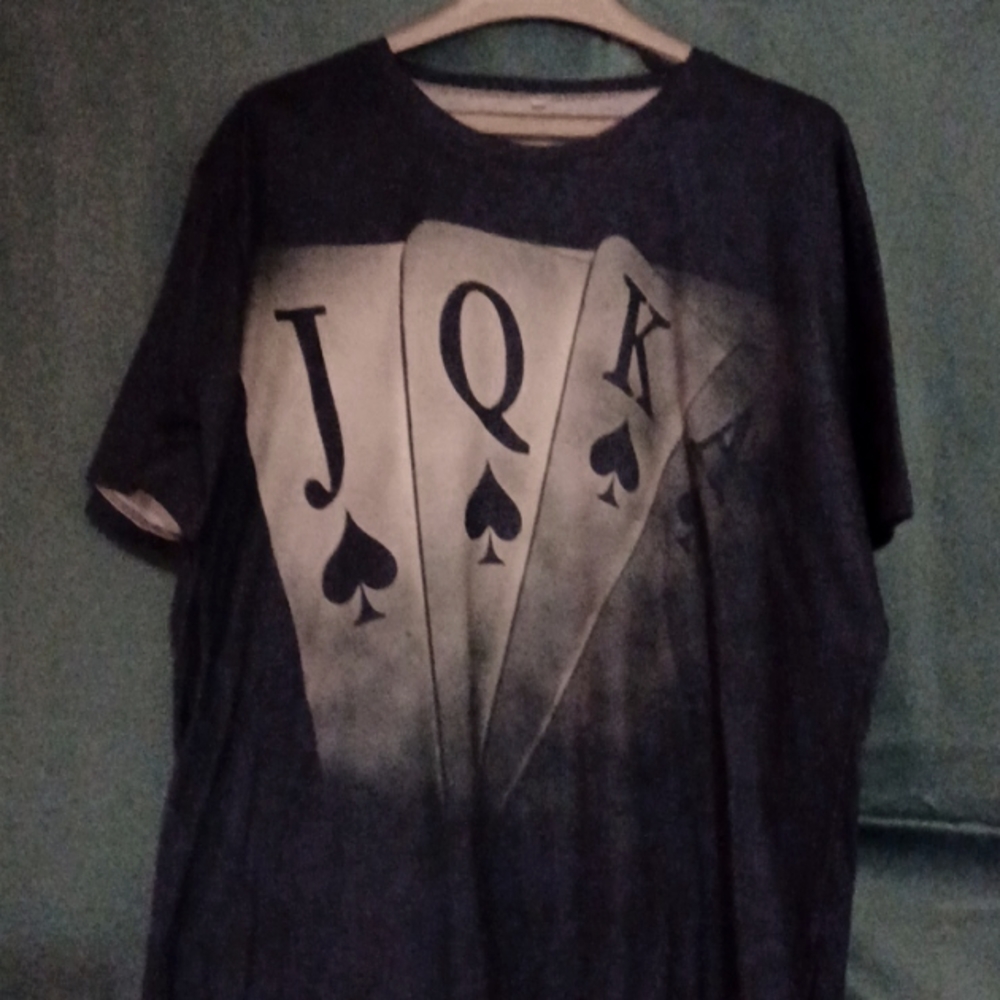 A 2x shirt with j k Q A . Like cards. It's new and comfortable